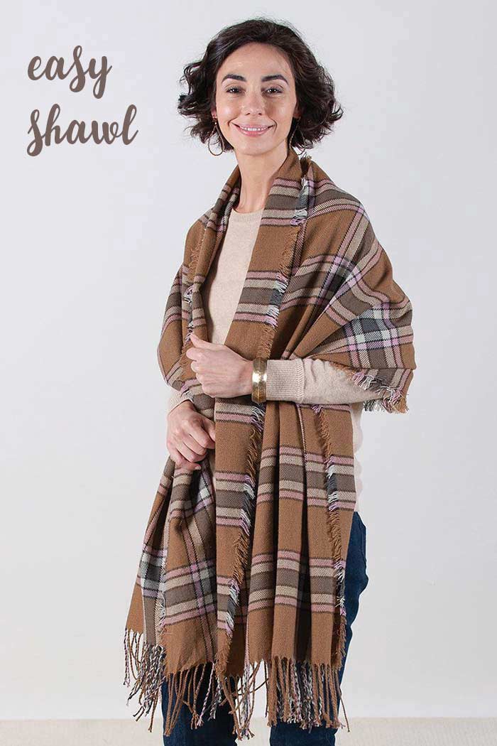 Wear a plaid wrap as an easy shawl over your shoulders