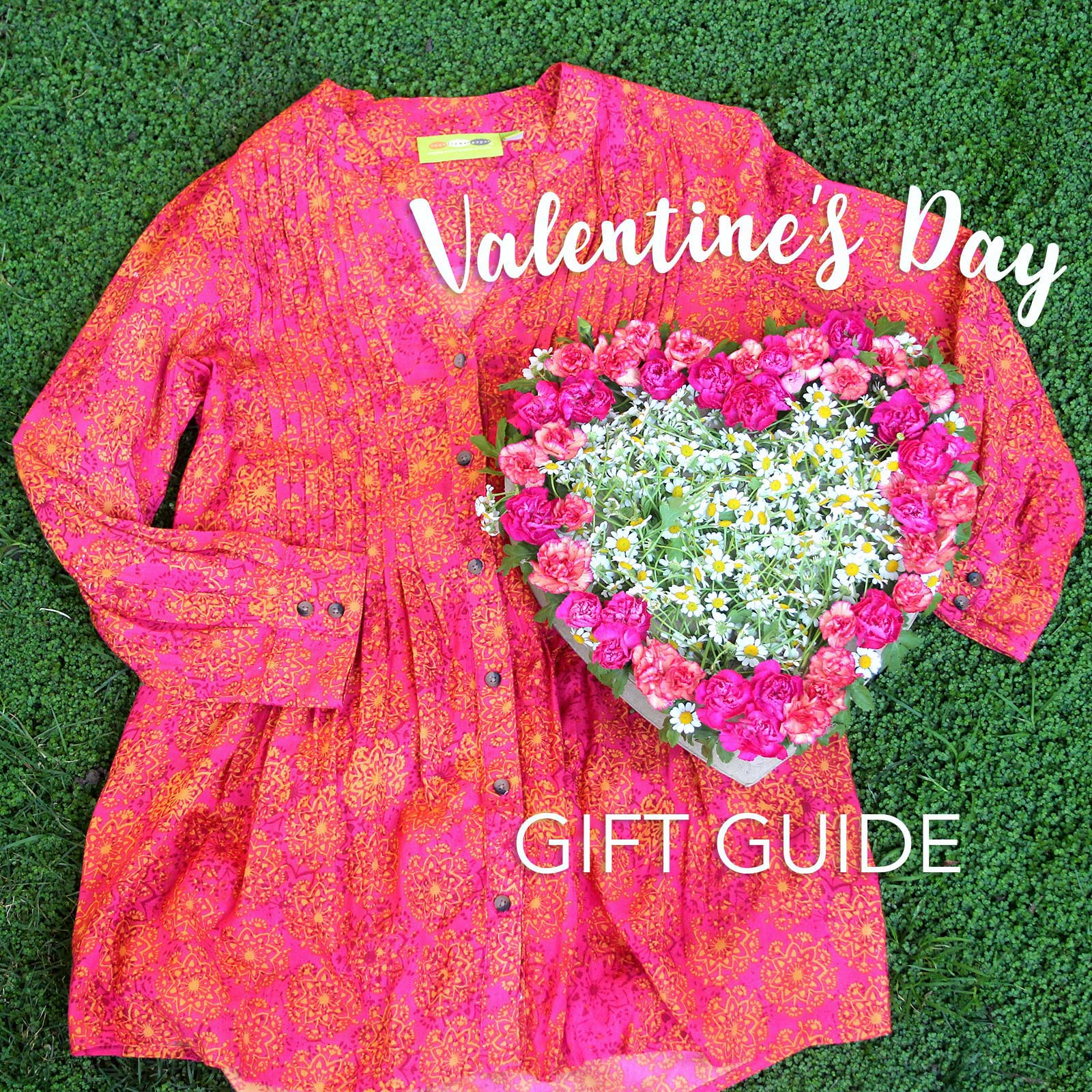 a pink women's tunic and a heart-shaped floewr box for valentine's day gifts