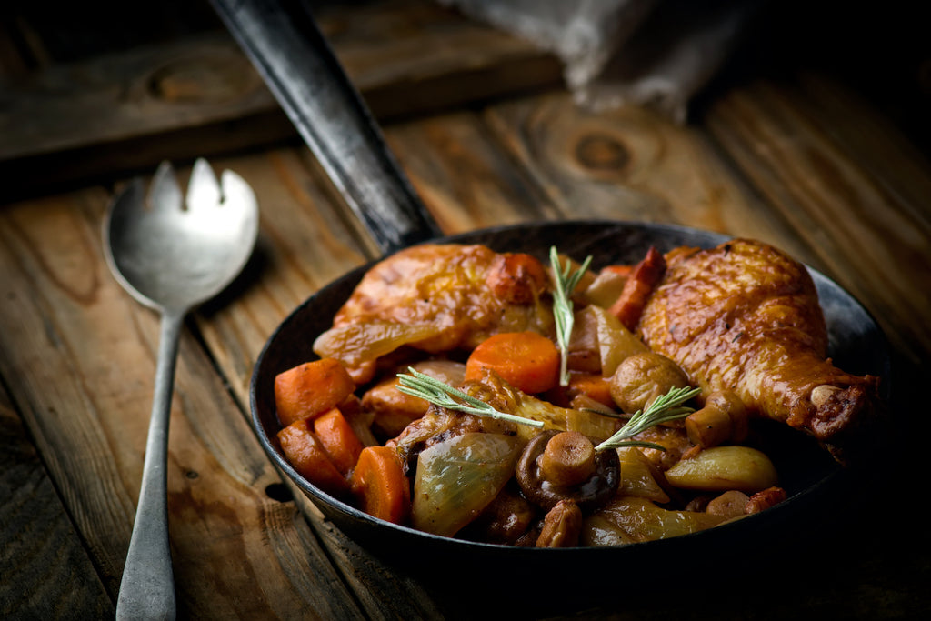 Chicken with mushrooms and vegetables in wine sauce