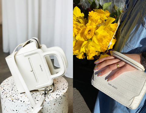 A split image of two white toned Sans Beast handbags, one on a terrazzo plinth and one held by Cienna's hand