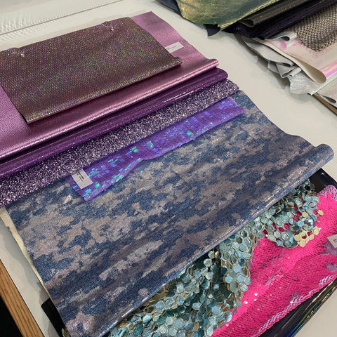 Image of colourful metallic swatches at Micam material and shoe fair in Milan, Italy