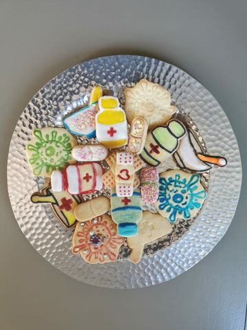 Colorful cookies made from cookie cutters for pharmacists