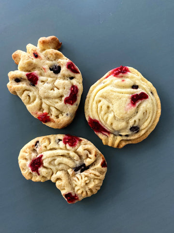 Cherry and chocolate cookies made from medical cookie cutters - brain cookies and heart cookies