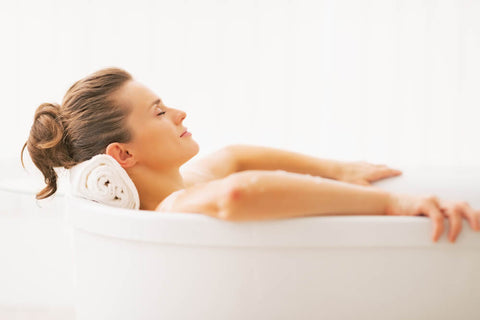 woman relaxing in a bath tub
