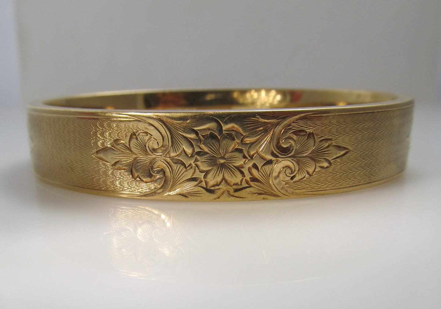 Vintage 14k gold engraved bangle bracelet