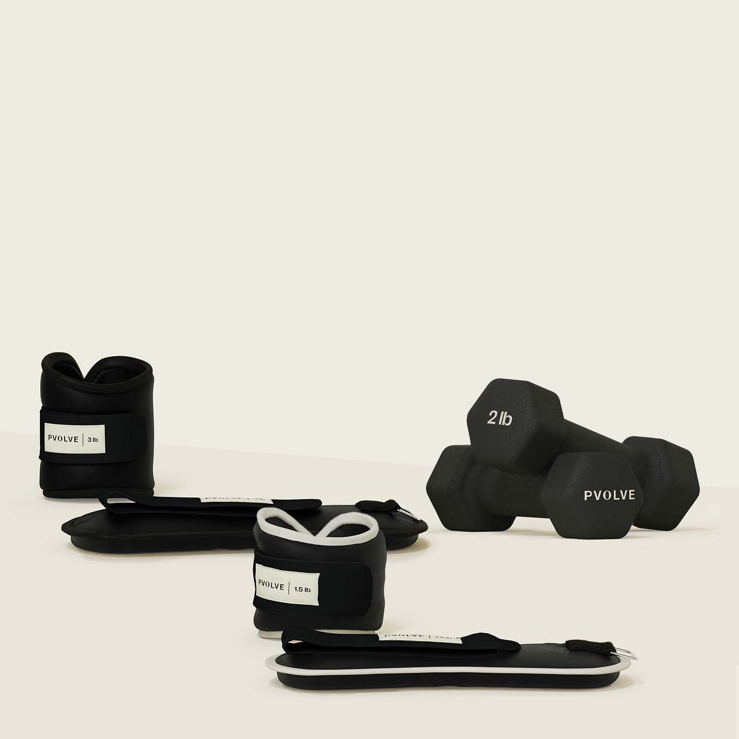 P.volve fitness equipment including dumbbells, ankle weights, and resistance bands.