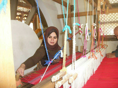 Akhmim - Woman weaving on horizontal loom