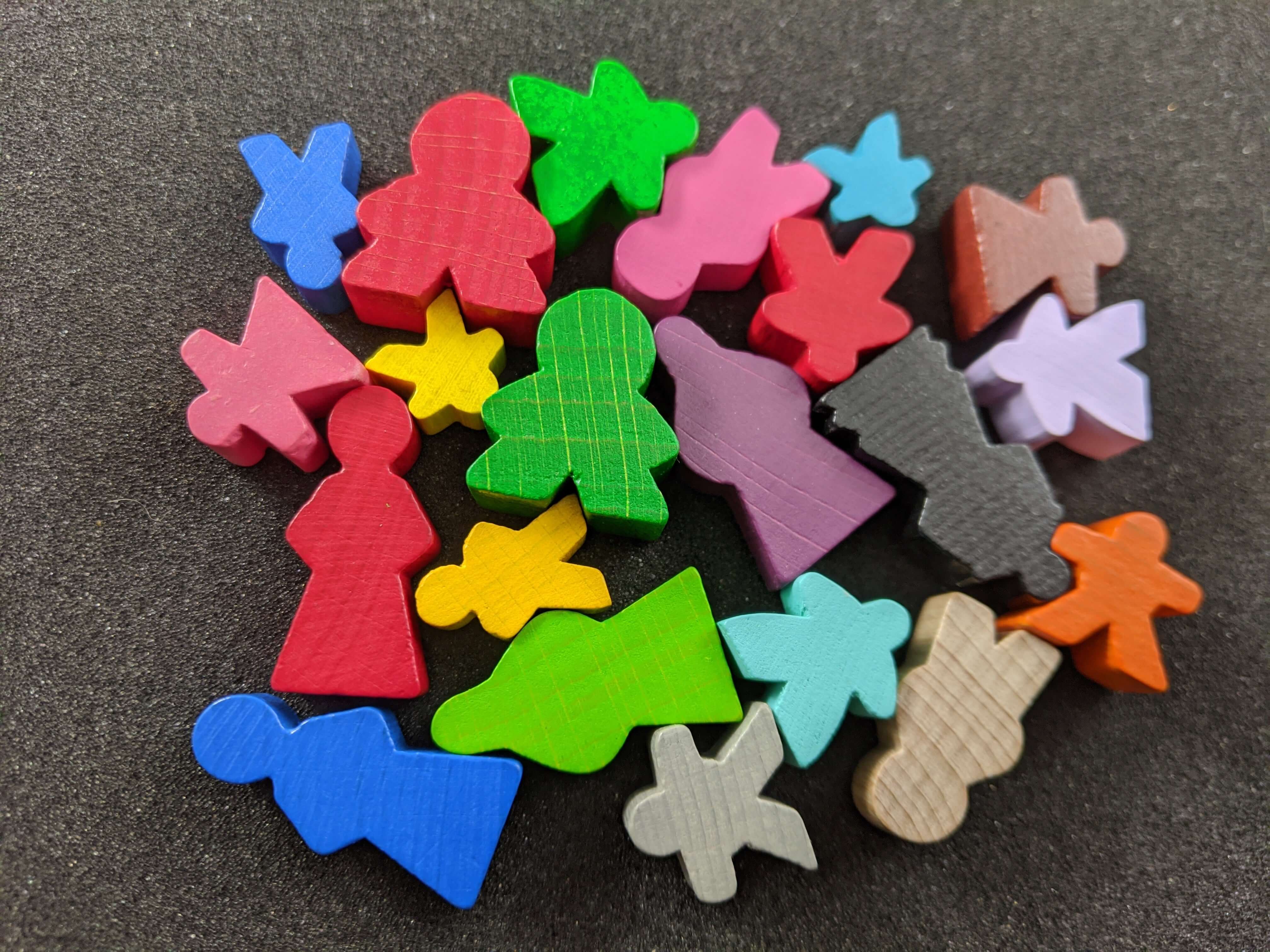 Meeples Board Game Pieces Person shaped board game pieces.