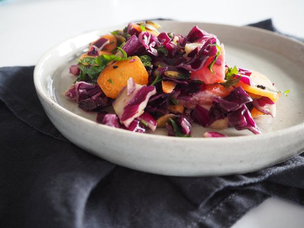 Quick Vegan Spring Salad Recipe | This vegan salad is a quick and easy recipe for vegetarian or vegan diets. Perfect for a healthy dinner or light lunch! Bursting with the flavours of blood orange, mint and parsley, this healthy salad features red cabbage, carrots and pistachios for a winning combination. Plus it's gluten free and just #veganrecipe #healthysalad #vegansalad #vegan #veganmeals #vegandinners #veganlunch #healthydinners #healthymeals #glutenfree 