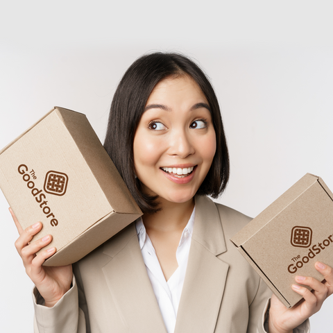 Girl holding Christmas gift boxes