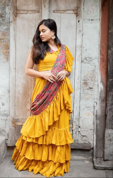 Mystique Melange: Orange printed ruffle saree – Garvili