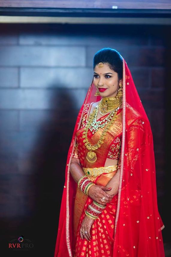 Image of pretty hindus girl wearing traditional indian saree dress and  ethnic jewelry covering her head with dupatta scarf Stock Photo | Adobe  Stock