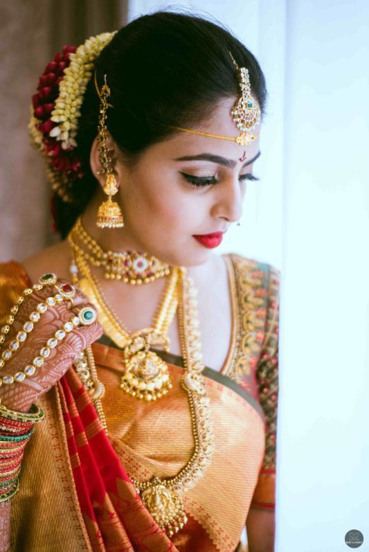 Stylish resort wedding of a Telugu bride and a Tambram groom! – Shopzters