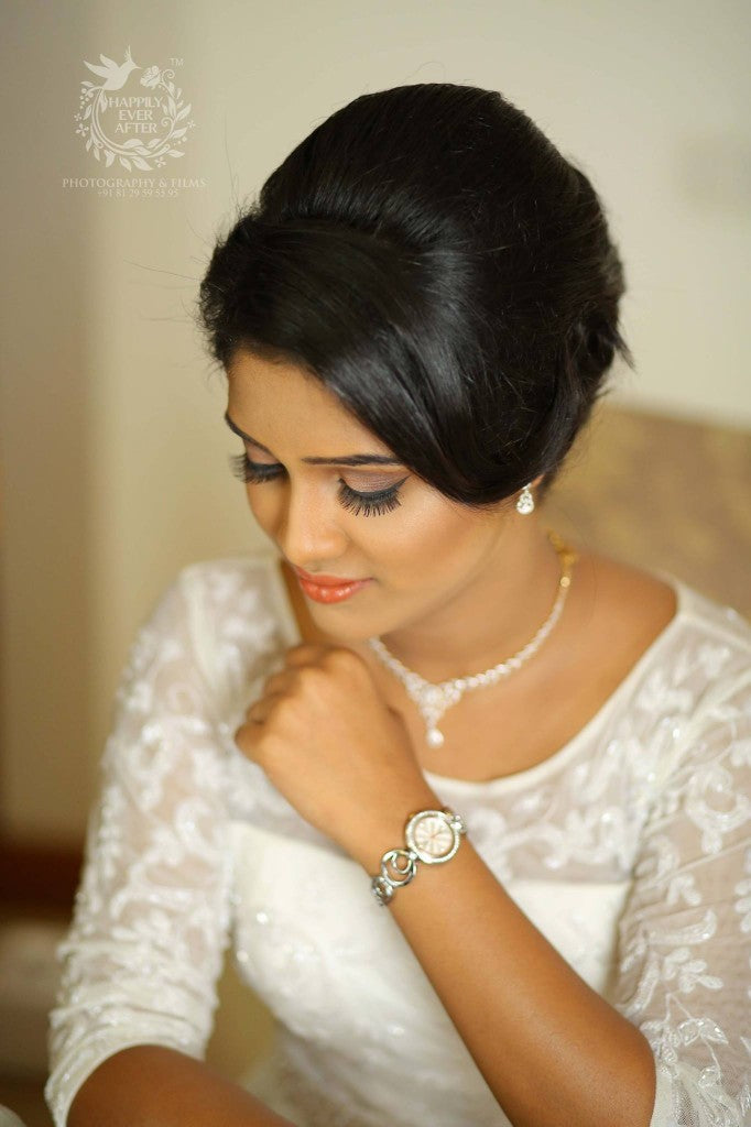 Elegant Bride with Ball Gown Dress Tiara and Down Hairstyle