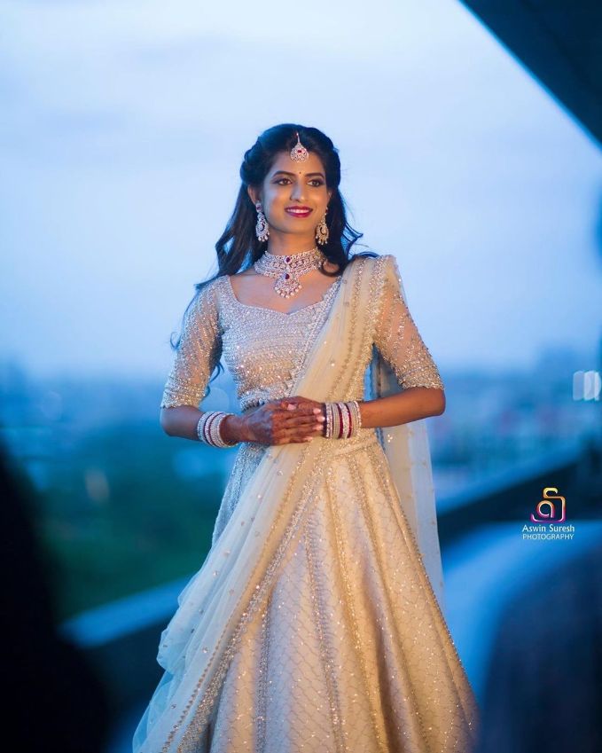 Photo of Pastel mint blue and blush pink engagement lehenga