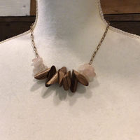 Shortie necklace with wood and light pink stones