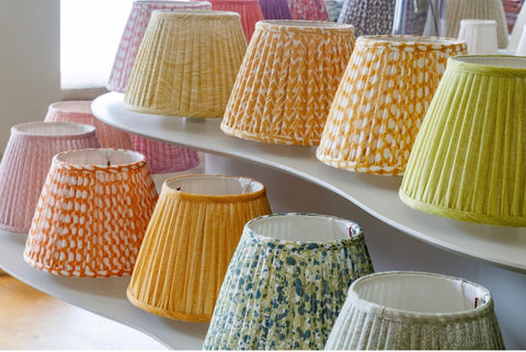 A row of colorful lampshades from Fermoie