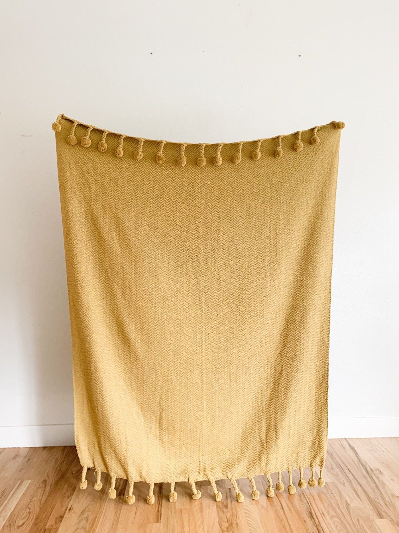Gold Cotton Throw Blanket With Pom Poms Stump Twig