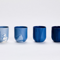 set of four mugs in shades of blue