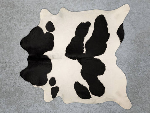 New black and white cowhide rug