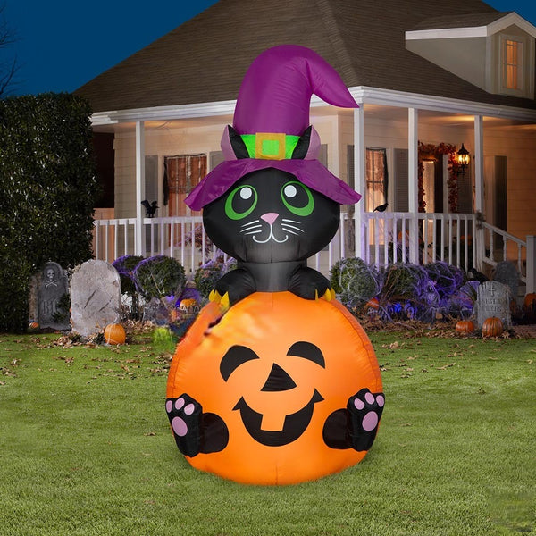 5 1/2' Halloween Cat Wearing A Witches Hat Holding A Pumpkin SKU: 225274