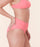 Side view of Andie Swim petal pink high-rise bikini bottom, showcasing sculpting compressive fabric for a chic fit.