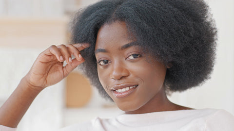black woman with dry natural hair