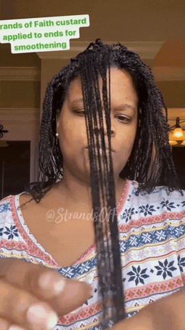 woman using flexi rods for bouncy twists on long natural hair