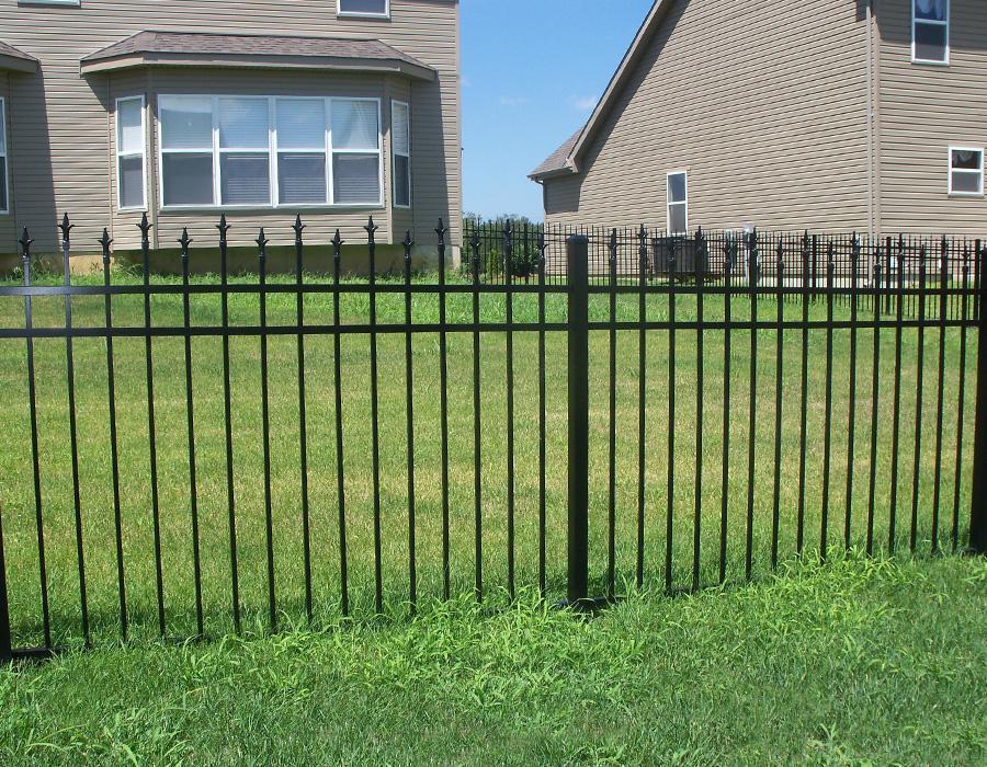 green aluminum fence