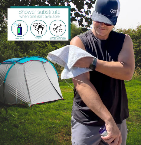 Man standing in front of tent wiping body with Pristine Body Cleansing Sprays. Test - Shower substitute when one isn't available. spray body. wipe off