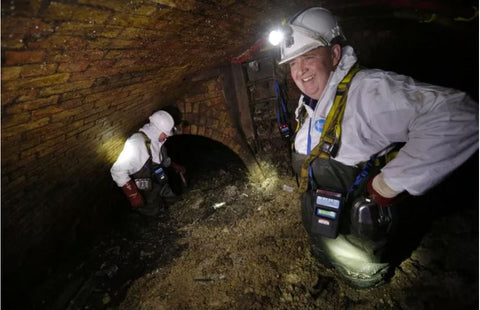 fatberg clogging city sewer extracted by sanitation crew