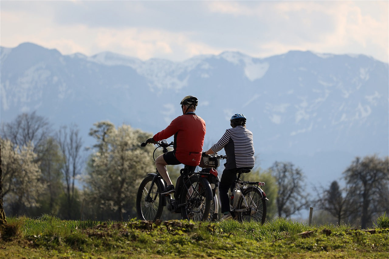 Two people out riding bikes.