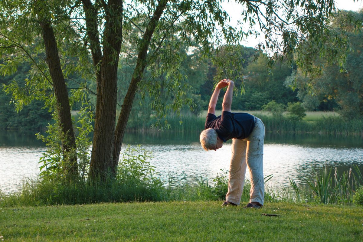  An older person stretching.