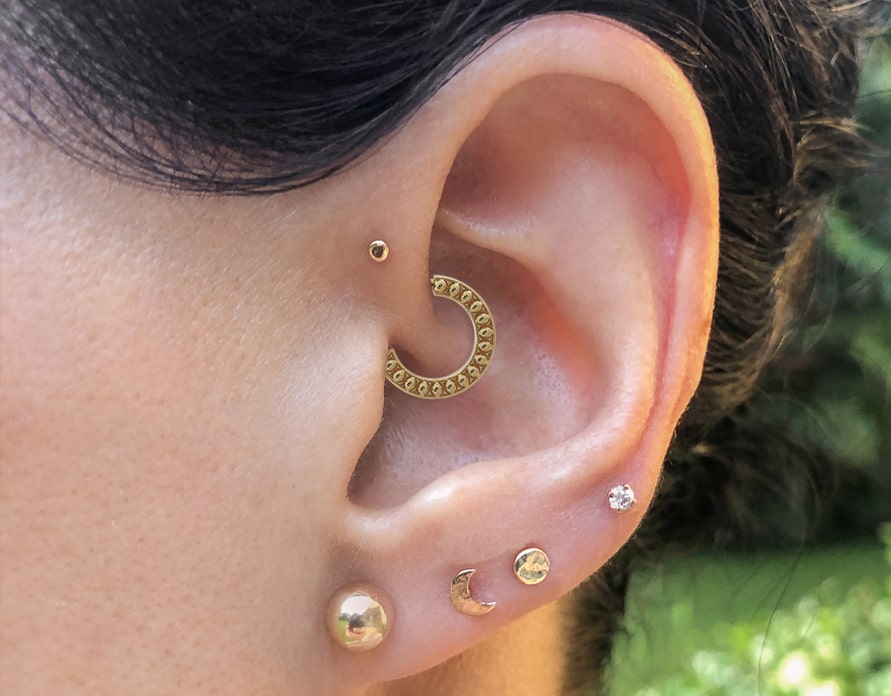 Daith Piercing Guide for 2022: Cost, Pain Level, and Side Effects