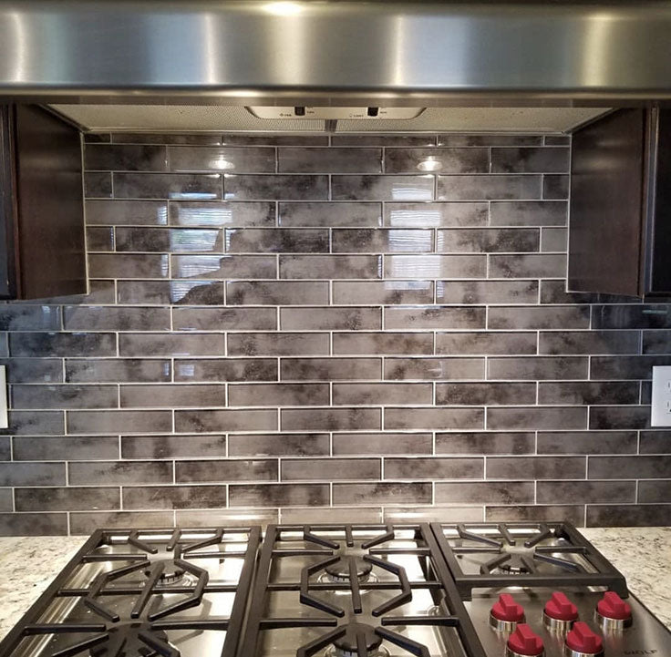 Marble Peel and Stick Tiles have an Adhesive Strong Enough for a Backsplash Behind the Stove