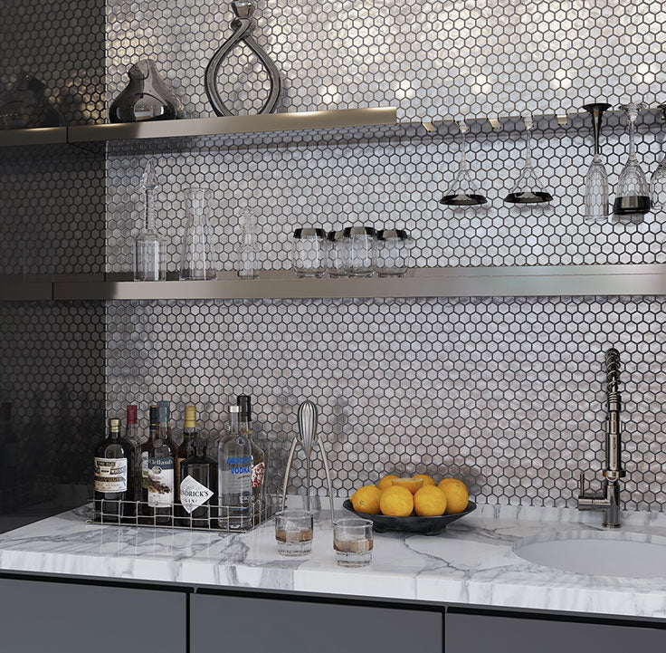 2021 is all about clean and organized, but that doesn't mean you can't add some fun shapes to the mix! This Matte Silver Hexagon Glass Mosaic Tile backsplash did just that, and we have to say, it did it very well.