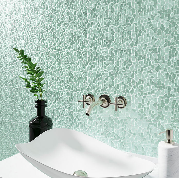  Diamond Aqua Glass Pebble Mosaic Tile is a great bathroom wall tile that’s easy to clean and offers a colorful design! 