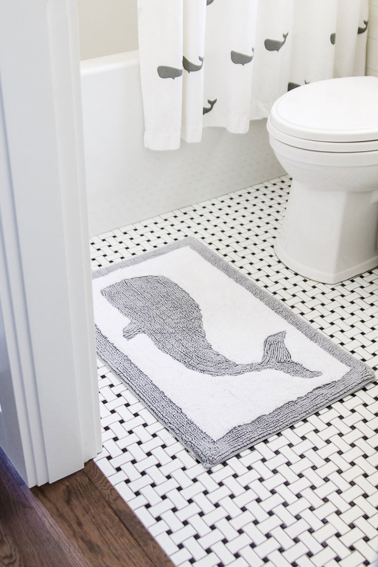 Whale Details made this White Marble Bathroom Kid-Friendly