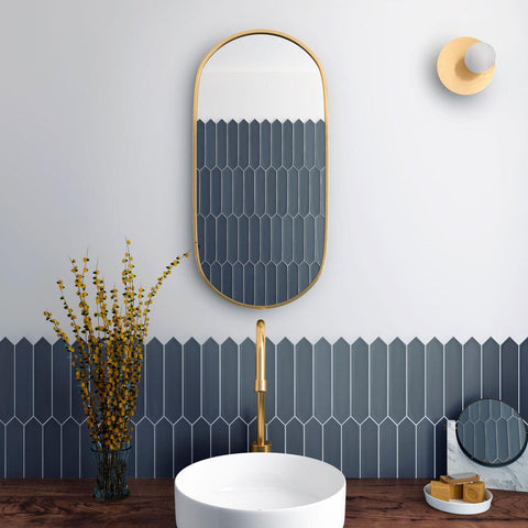 Navy blue ceramic picket tile bathroom sink backsplash