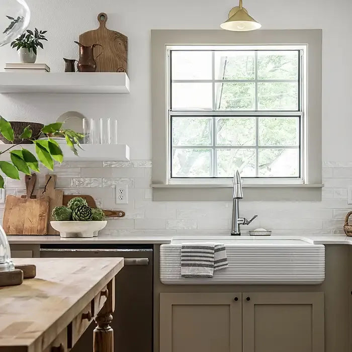 Blue handmade ceramic subway tile backsplash on HGTV