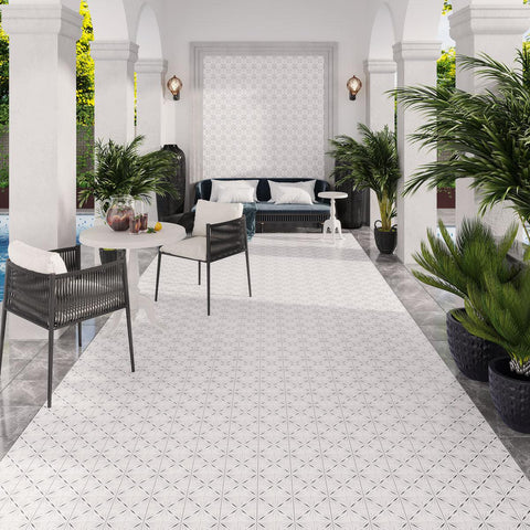 Outdoor living area with White Sparkle Waterjet Marble Mosaic Tile floors and Accent Wall