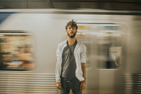 man in front of the train