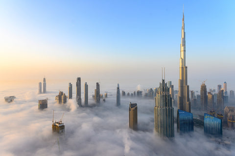 Dubai Skyscape view with the Burj Khalifa above the clouds United Arab Emirates 