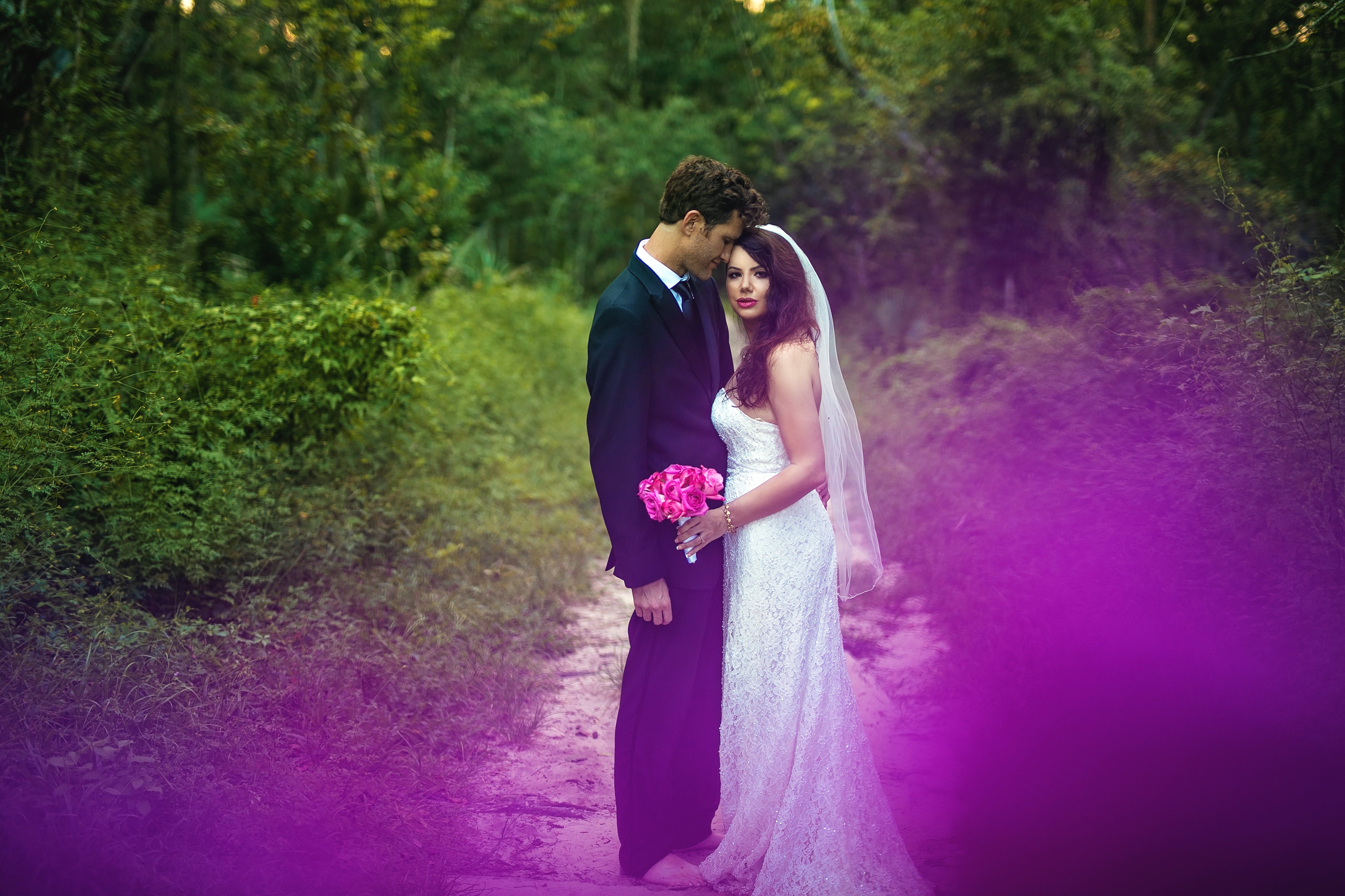 portrait of wedding couple in the forest