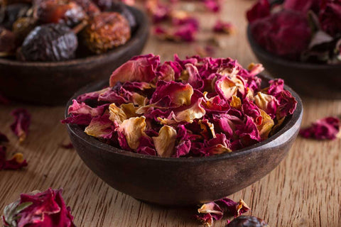 Dried Rose Petals As Herbal Tea Is In Hand Stock Photo, Picture