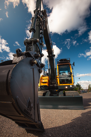 Hyundai HX145ALCR Willowbrook excavator fitted with a narrow black Rhinox digging bucket