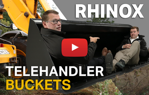2x males sat inside a Rhinox telehandler bucket
