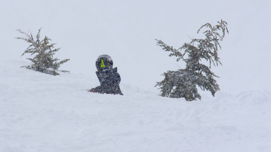 Young skier getting up