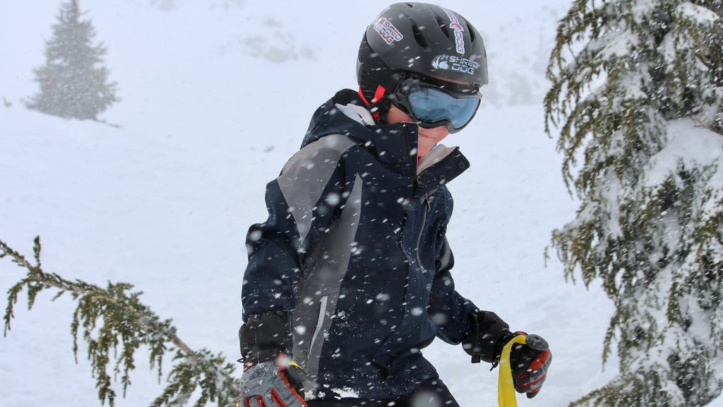 Young skier enjoying the slopes in SHRED DOG kids winter gear