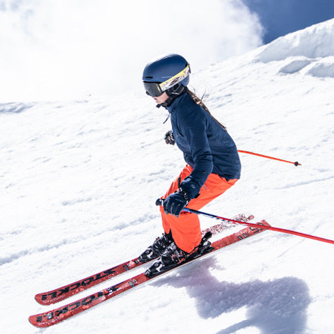 Girl skiing in Akova puffy jacket